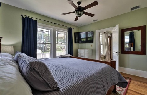Historic District House | Storybook home with wrap around porch and deck