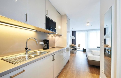 Bensersiel Apartment | Strandnahes 1-zimmer Apartment mit Balkon Inkl. Schwimmbad- & Saunanutzung