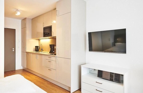 Bensersiel Apartment | Strandnahes 1-zimmer Apartment mit Balkon Inkl. Schwimmbad- & Saunanutzung