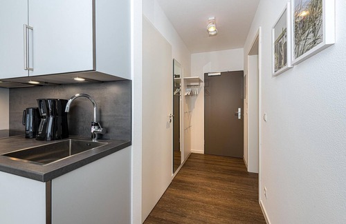 Bensersiel Apartment | Strandnahes Ferienapartment mit Terrasse, Parkplatz, Schwimmbad- & Saunanutzung