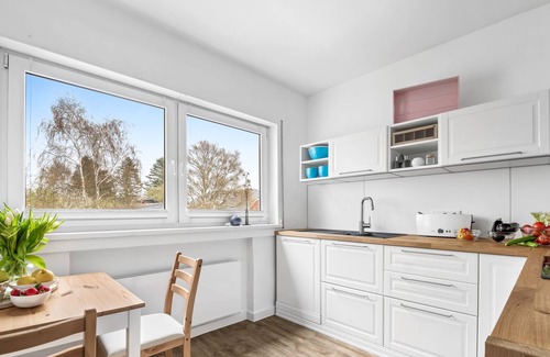Steinbergkirche Apartment | Strandhafer - 1st floor, balcony, barbecue, washing machine, bathtub, shower, guest WC