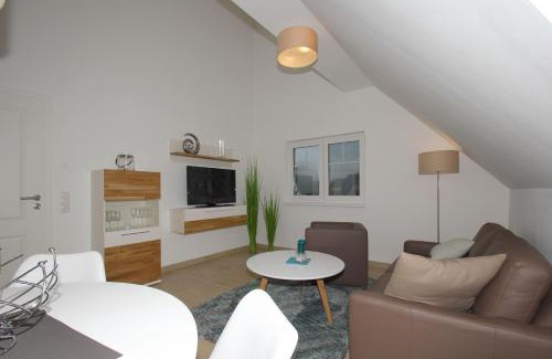 Lobbe Apartment | strandnahe FeWo mit Balkon, gratis Nutzung vom AHOI Erlebnisbad und Sauna in Sellin - Rex Rugia FeWo 13-8