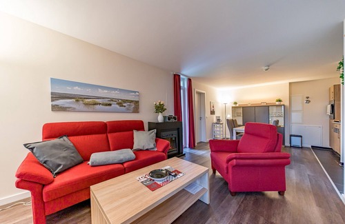 Wremen Apartment | Strandnahe, Schöne Wohnung mit Sauna, Terrasse mit Strandkorb und Landblick