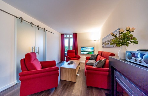 Wremen Apartment | Strandnahe, Schöne Wohnung mit Sauna, Terrasse mit Strandkorb und Landblick