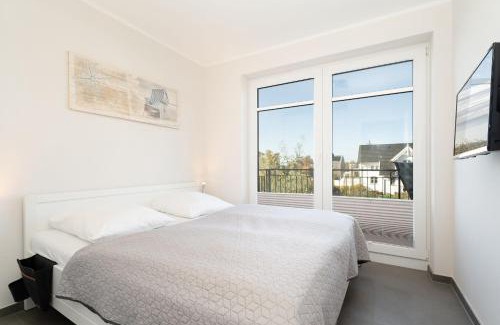 Fehmarnsund Apartment | Strandresidenz Vogelflug App 12