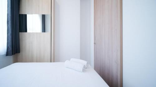 Surabaya Apartment | Strategic and Homey 1BR at The City Square Apartment By Travelio