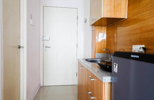 Surabaya Apartment | Strategic Studio Apartment at Orchard Mansion Supermall By Travelio
