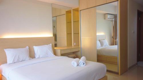 Hegarmanah Apartment | Strategic Studio Apartment at Beverly Dago with Mountain View By Travelio