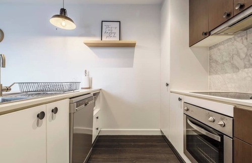 Victoria Apartment | Stroll to the beach + Indoor Parking!