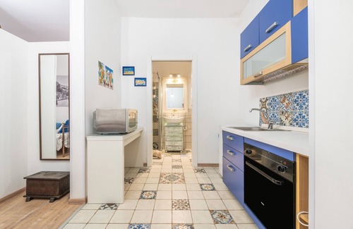 Marina District House | Studio Apartment 'Alla Marina Monolocale Deluxe' with Balcony, Wi-Fi and Air Conditioning