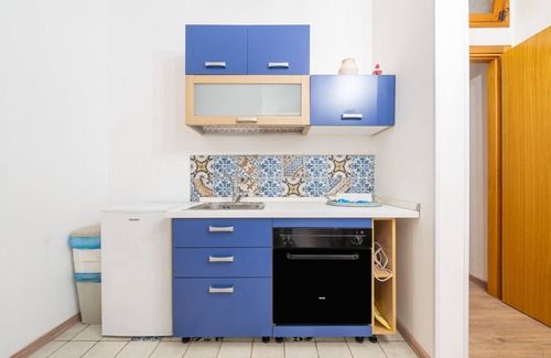 Marina District House | Studio Apartment 'Alla Marina Monolocale Deluxe' with Balcony, Wi-Fi and Air Conditioning