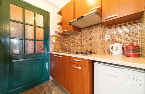 Lakones Apartment | Studio Apartment "Arianna Studio Ground Floor 8" with Sea View, Shared Pool & Wi-Fi