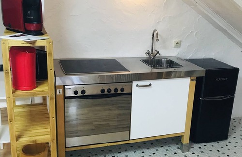 Homburg Apartment | Studio apartment below the university clinic * box spring bed, kitchenette and bathroom *
