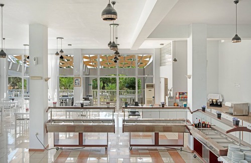 Kardamena Apartment | Studio Apartment 'Evripides Triple Room 1' with Shared Pool, Shared Garden and Air Conditioning