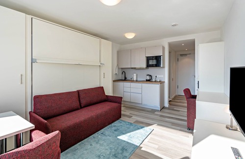 Furstenfeldbruck District Apartment | Studio Apartment "Huber Living Basic 204" with Balcony & Wi-Fi