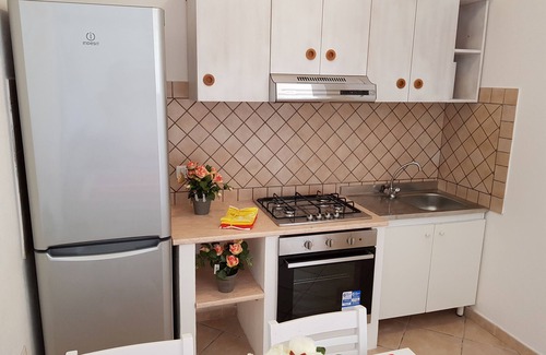 Badesi Apartment | Studio apartment Mare with barbecue, terrace in the centre of the village
