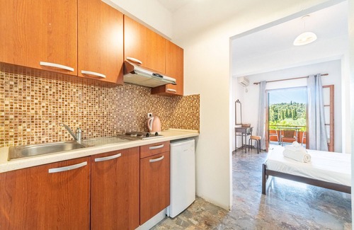 Lakones Apartment | Studio "Arianna Studio Ground Floor 3" with Sea View, Shared Pool & Wi-Fi