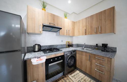 Ain Harrouda Apartment | Studio Confortable avec Balcon, Piscine, Jardin et Aire de Jeux