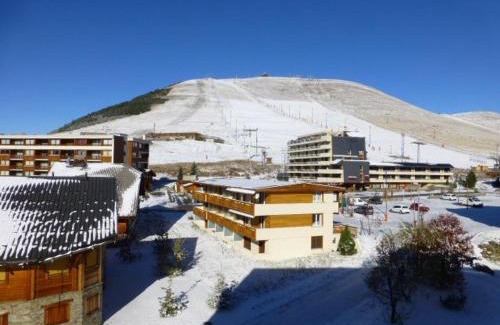 Cognet Apartment | Studio cosy pour 4 à L'Alpe d'Huez - Emplacement idéal, animaux acceptés, proche pistes et commerces - FR-1-405-96