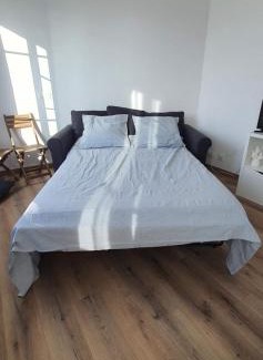 Faubourg-du-Roule Apartment | Studio de charme toits parisiens