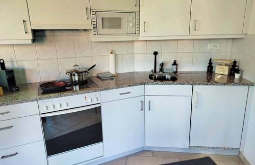 Faulensee Apartment | Studio mit Aussicht fast bis nach Interlaken/free WIFI/Parking