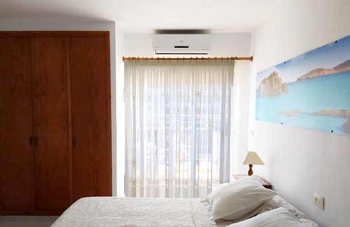 Portinatx Apartment | Studio next to the beach with pool view