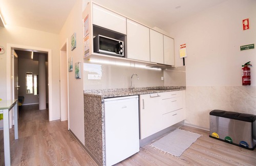 Santana House | Studio north lower-level w/kitchenett and patio