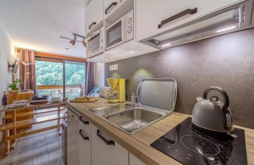 Le Corbier Apartment | Studio Soyouz Vanguard-63 by Interhome