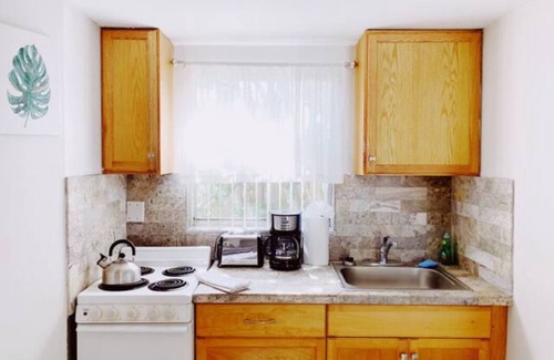 Deerfield Beach Apartment | Studio Steps from Beach~ Kitchen | Pool | parking