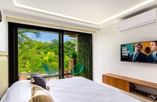 12th Street Apartment | Studio with AC Kitchen Pool Gym and Rooftop view