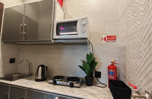 Al Faisaliyah Apartment | Studio with hotel furniture and a prime location