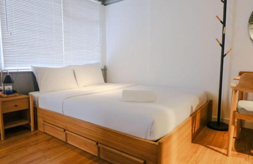 Cipaganti Apartment | Studio with Private Living Room at Jarrdin Cihampelas Apartment By Travelio