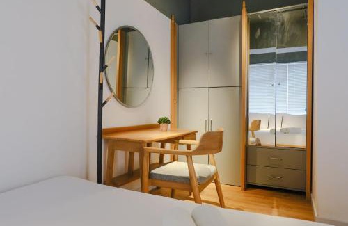 Cipaganti Apartment | Studio with Private Living Room at Jarrdin Cihampelas Apartment By Travelio