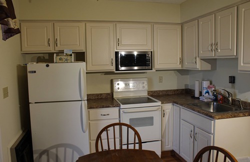 Wells Apartment | Studio with screened balcony, pool table, & seasonal pool - near beaches