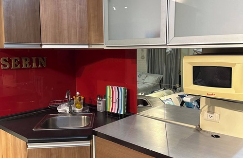 Silang Junction South Condo | StudioCo - Tagaytay Staycation with AC, WiFi & Netflix access accessible