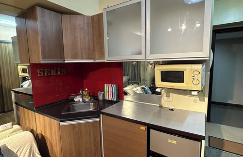 Silang Junction South Condo | StudioCo - Tagaytay Staycation with AC, WiFi & Netflix access accessible
