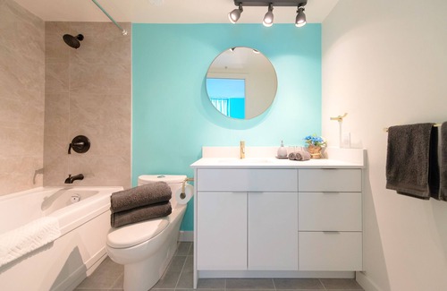 West End Apartment | Stunning 2-Bedroom Downtown Apartment with Water Views & Gym Access