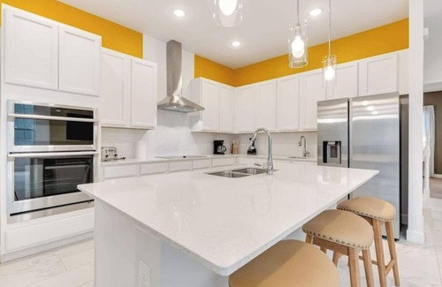 Reunion House | Stunning 5-Bedroom Pool Home in Reunion Resort – Close to Disney, Themed Rooms, Games & Theater Room