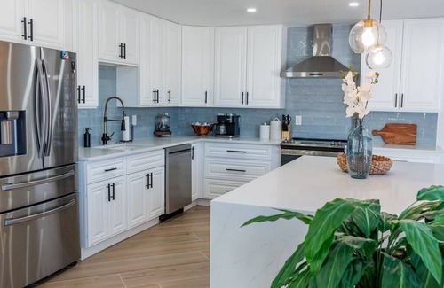 Bonita Springs House | Stunning! Barefoot Breeze - Brand New Pool with Putting Green! Waterfront with Boat Dock!