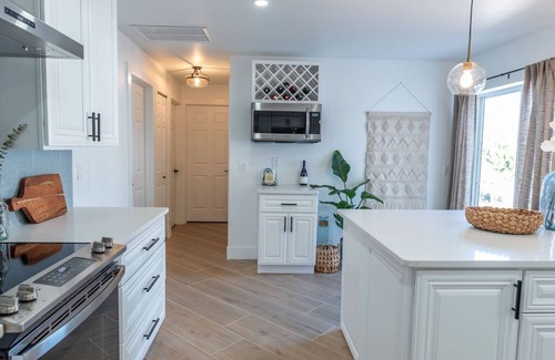 Bonita Springs House | Stunning! Barefoot Breeze - Brand New Pool with Putting Green! Waterfront with Boat Dock!