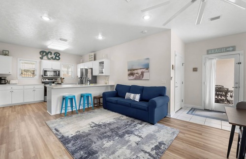 Bel Air House | Stunning Beachside Townhouse with Pool, 2 Car Garage, and Lagoon Access