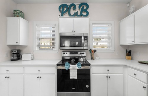Bel Air House | Stunning Beachside Townhouse with Pool, 2 Car Garage, and Lagoon Access
