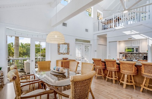 Bokeelia House | Stunning canal-front home with pools, AC, W/D & hammock