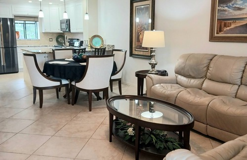 Central Naples Condo | Stunning Condo in Naples Bath & Tennis-Lake Views-Pool & Hot Tub-Great Location!
