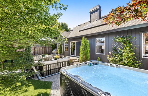 Santa Rosa House | Stunning, dog-friendly home with hot tub, fireplace, yard, & botanical decor
