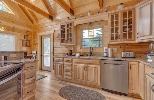 Gatlinburg - Pigeon Forge Cabin | Stunning Gatlinburg Mountain Views with a Hot Tub, Billiards + Seasonal Pool Acc