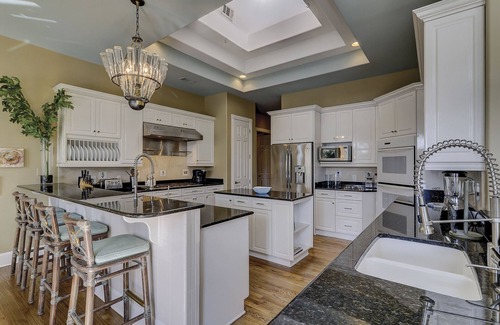 Palmetto Dunes House | Stunning home with private pool and hot tub with beautiful view of the lagoon