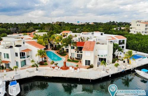 Puerto Aventuras Apartment | Stunning Large Remodeled Penthouse-Big Canal Views