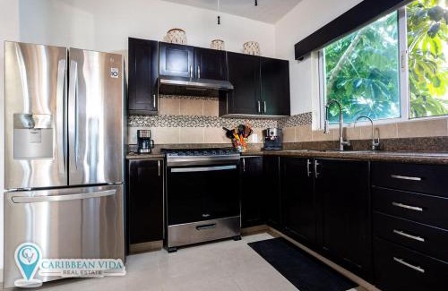 Puerto Aventuras Apartment | Stunning Large Remodeled Penthouse-Big Canal Views