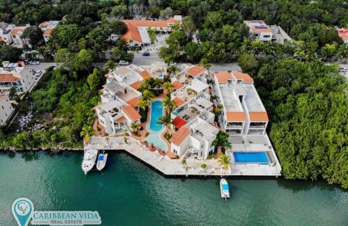 Puerto Aventuras Apartment | Stunning Large Remodeled Penthouse-Big Canal Views